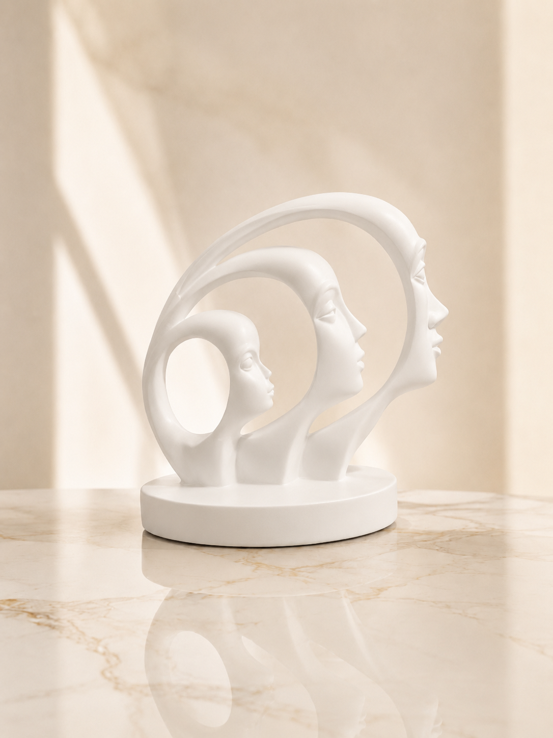 Three Faces Sculpture