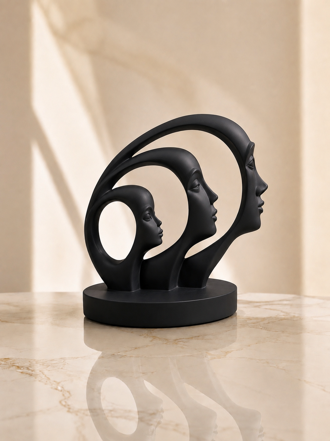 Three Faces Sculpture